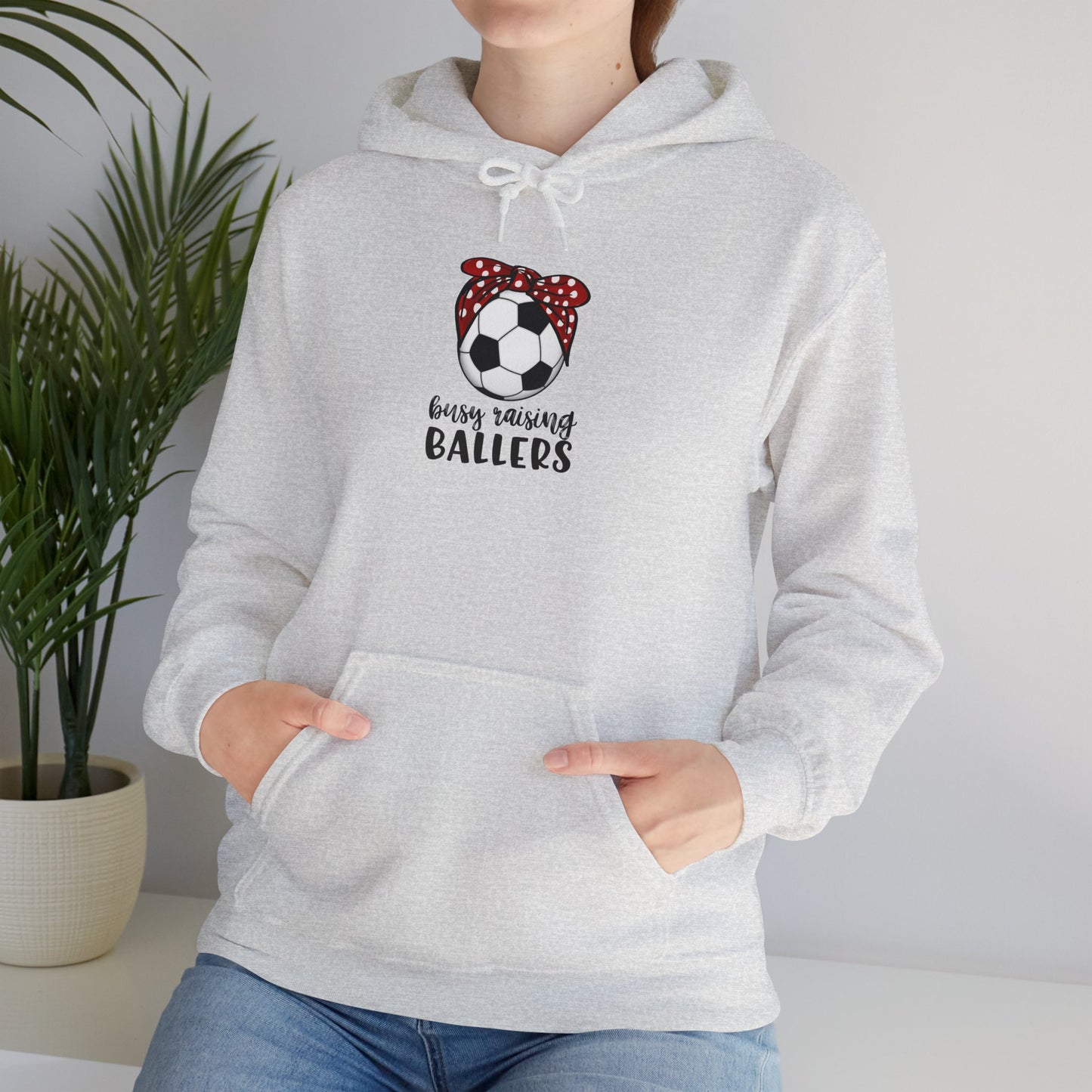 Busy Raising Ballers Soccer Mom Unisex Heavy Blend™ Hooded Sweatshirt with red polka dot bandana